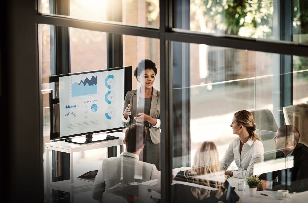 Shot of a businesswoman delivering a presentation to her colleagues in the boardroom