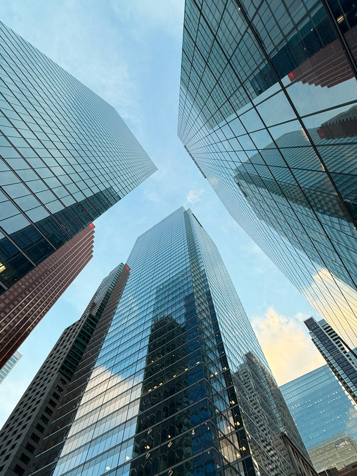 Modern glass skyscrapers in a business district symbolizing corporate growth, reflecting the Dubai UAE training location