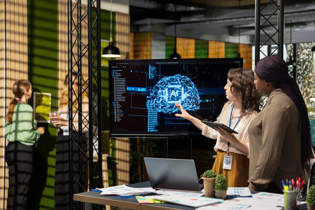 Powerful diverse team leveraging deep learning with big data algorithms, optimizing company performance with AI software.